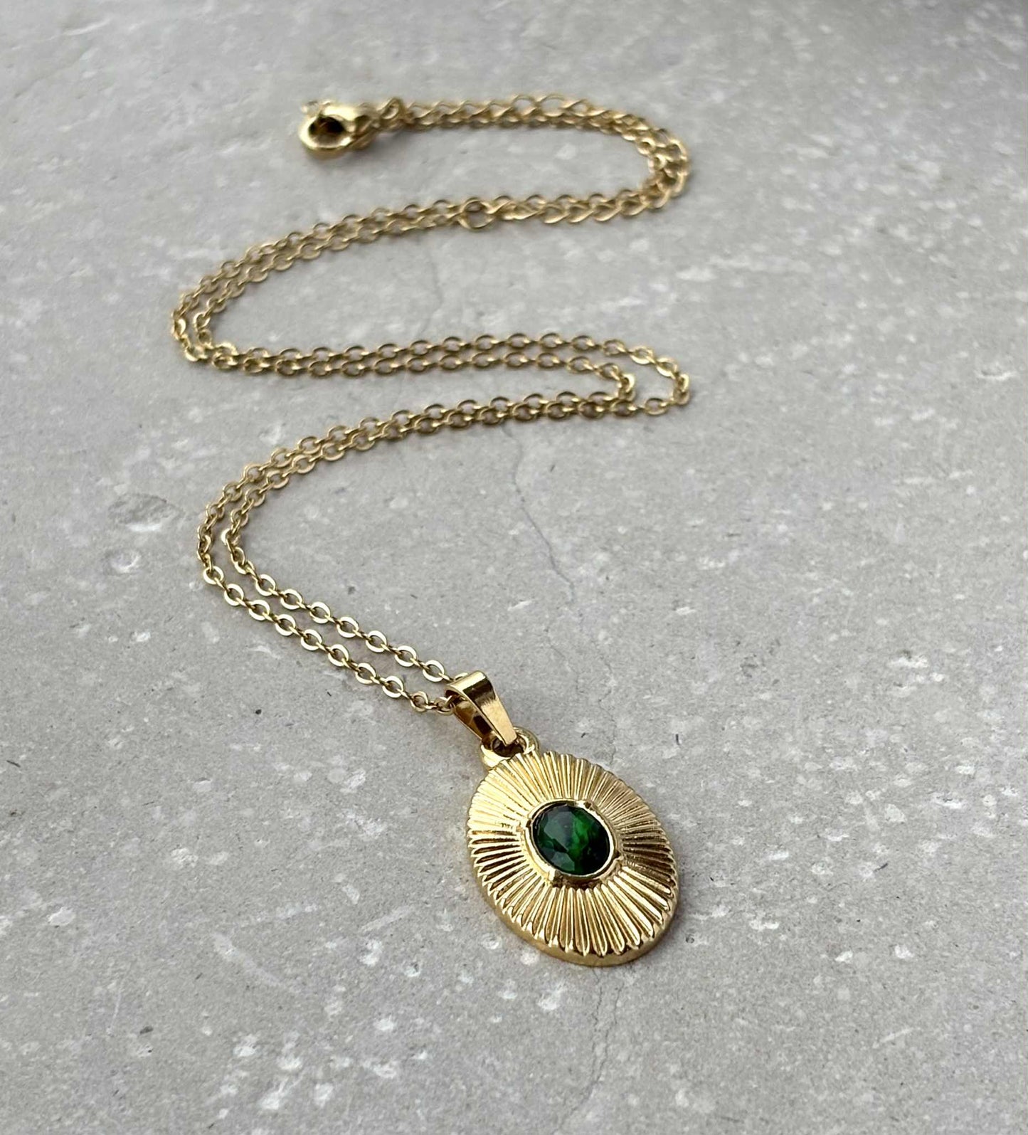 Shield Pendant With Green Stone